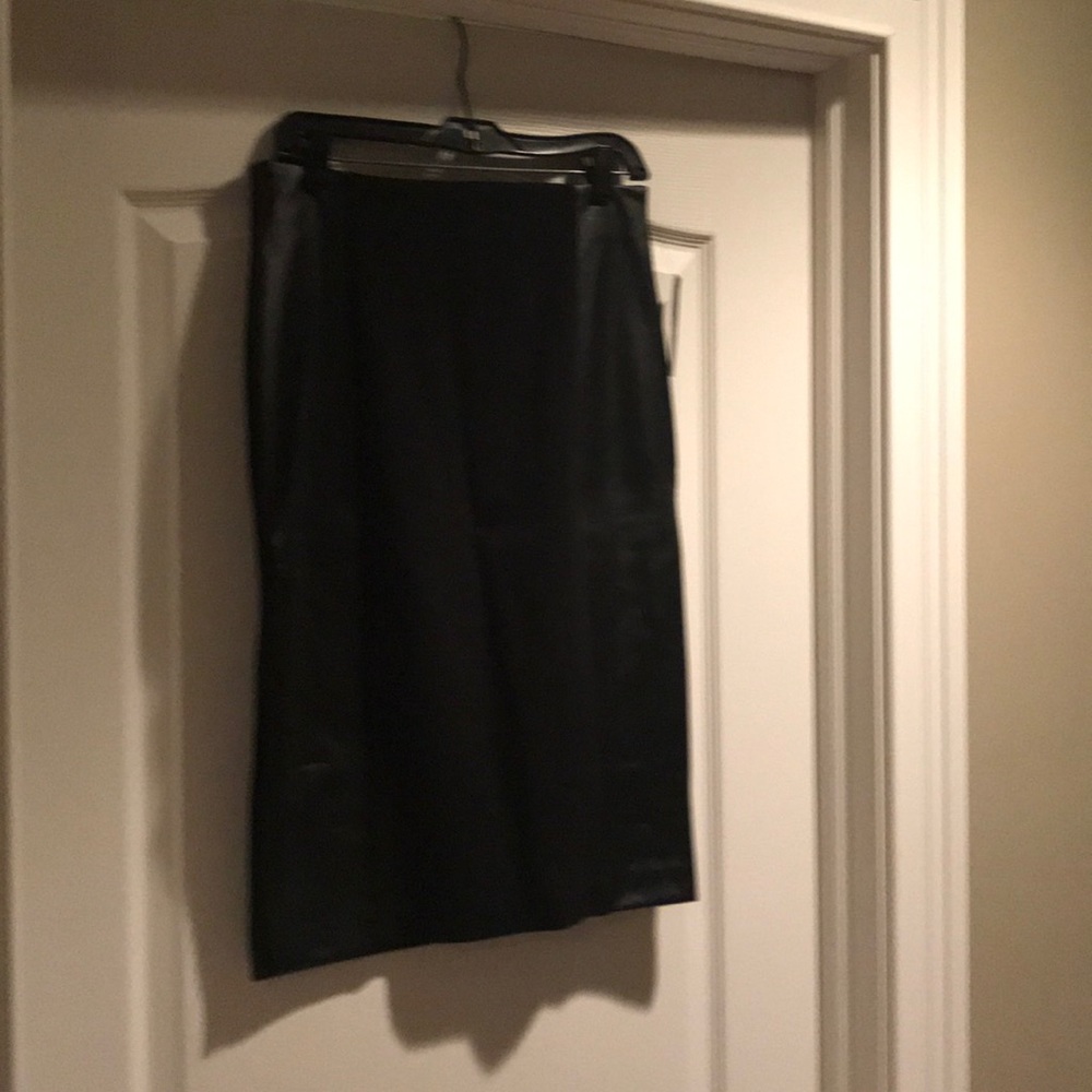 Skirt.  just below the knee.  4” slit on R side.